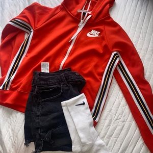 Nike red sweatshirt only. Socks and shorts not included.